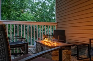 Outdoor stone fire pit table