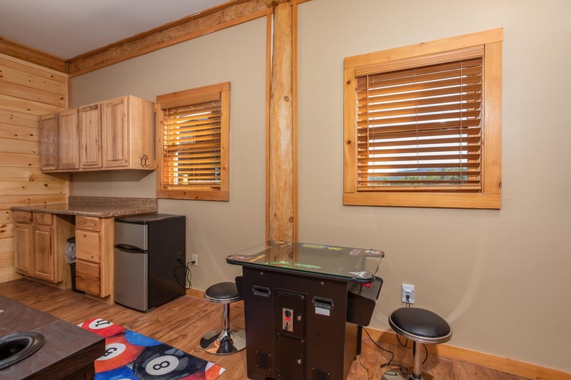 Arcade game table in the gameroom at Great View Lodge, a 5bedroom cabin rental located in Pigeon Forge