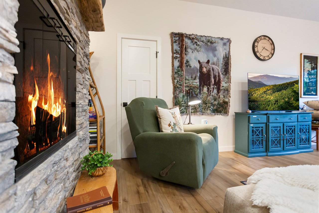 Upstairs living room with comfy chair.