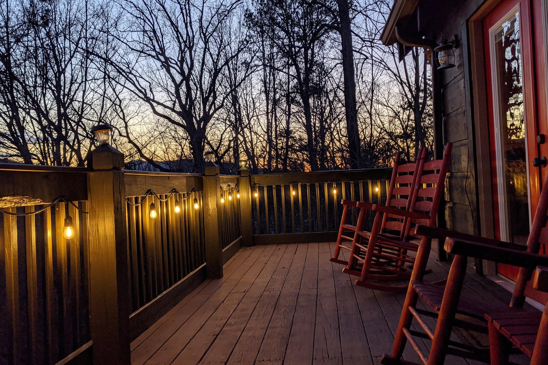 Outdoor wooden rocking chair with lighted deck