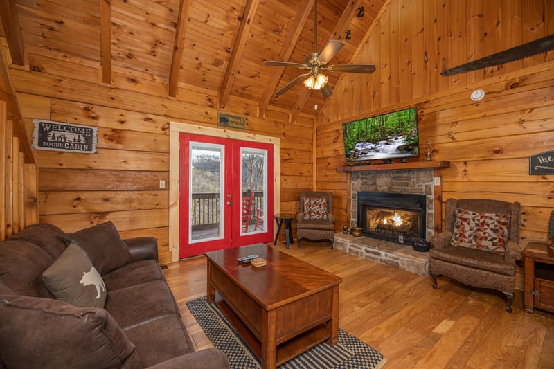 Living room with stone fireplace