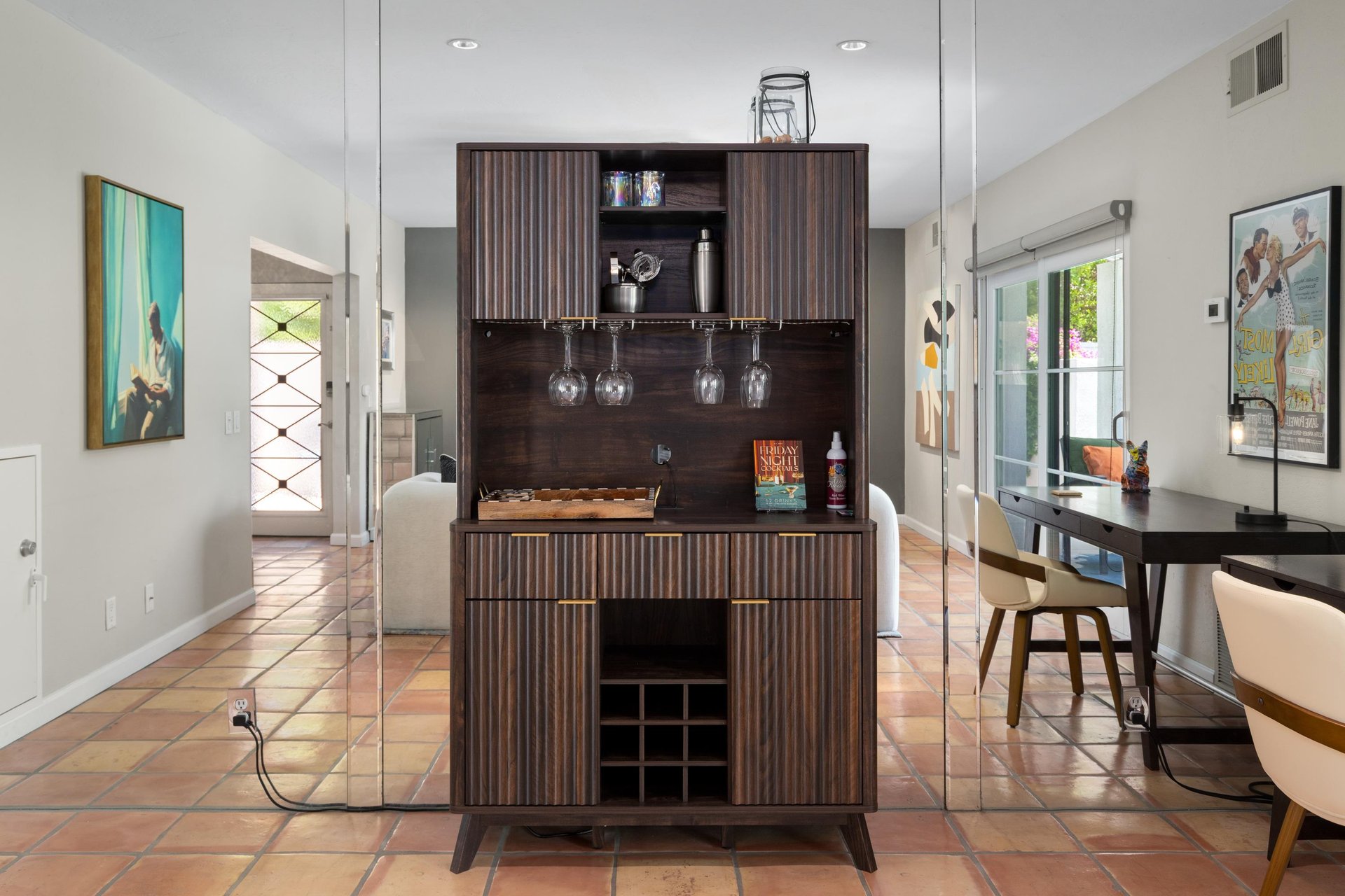 Bar area with wine glasses.