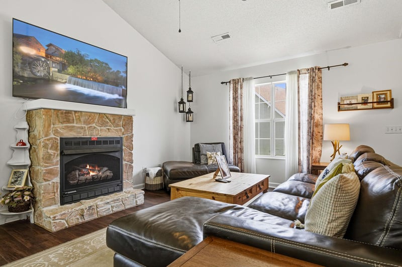 Sink into plush leather sofas by the fireplaces glow, while your favorite shows play on the big screen—your cozy gathering spot awaits.