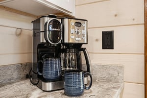 Start your mornings right with a full coffee maker set up for brewing your favorite cup any time you like.