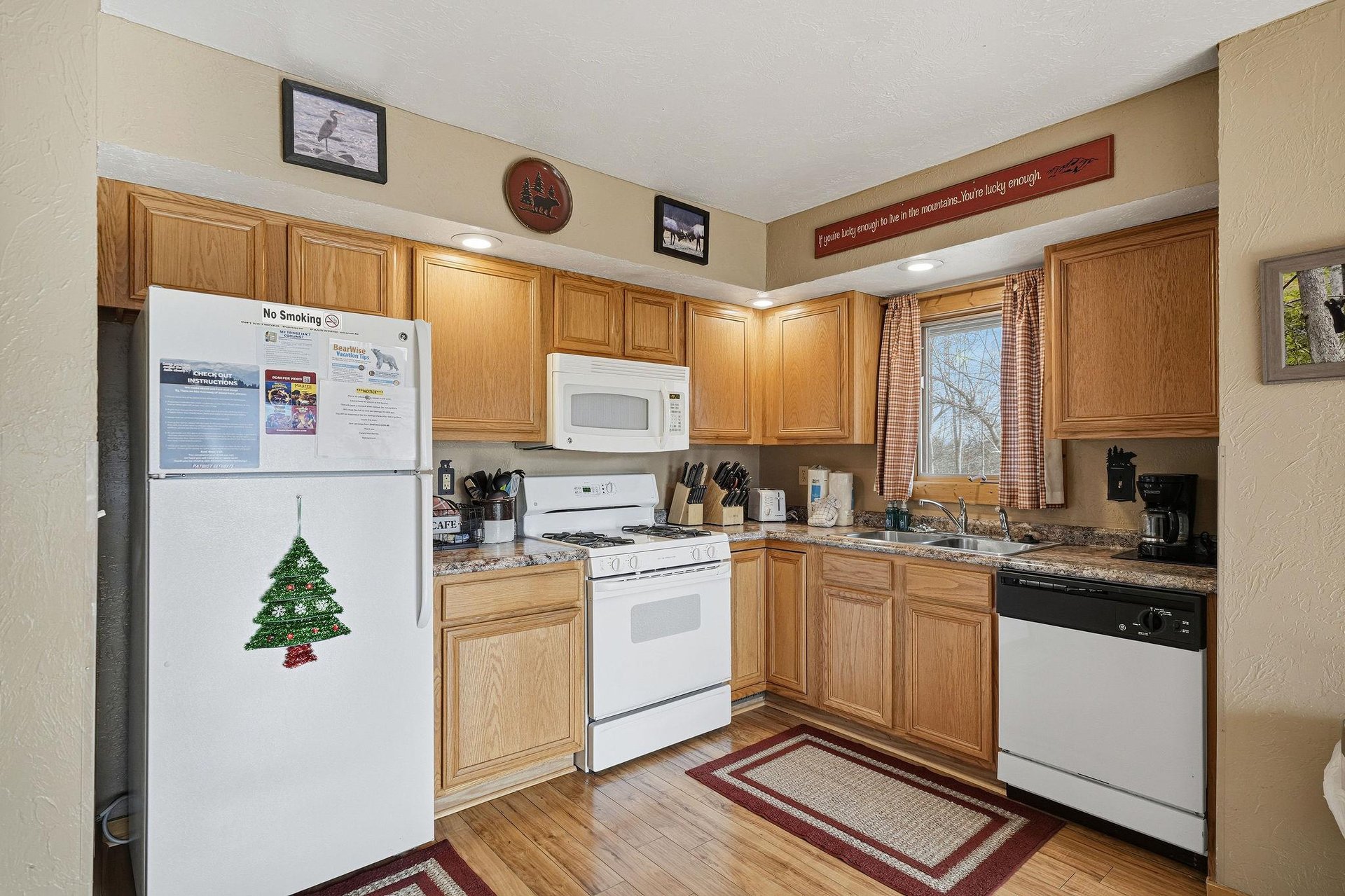 Your fully equipped kitchen awaits with granite counters, oak cabinets, and all appliances needed for homecooked meals during your stay.