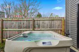 Soak away your stress in your private hot tub, surrounded by a peaceful fenced yard under open skies.