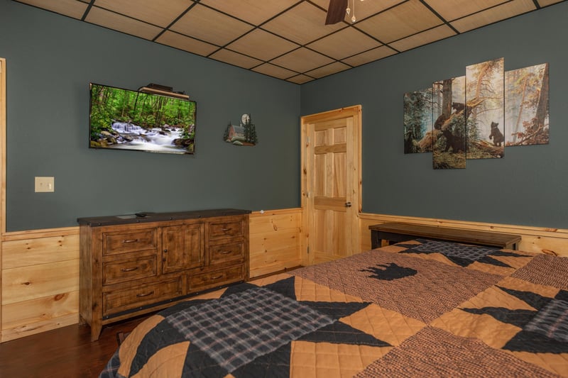 King bed facing dresser and tv
