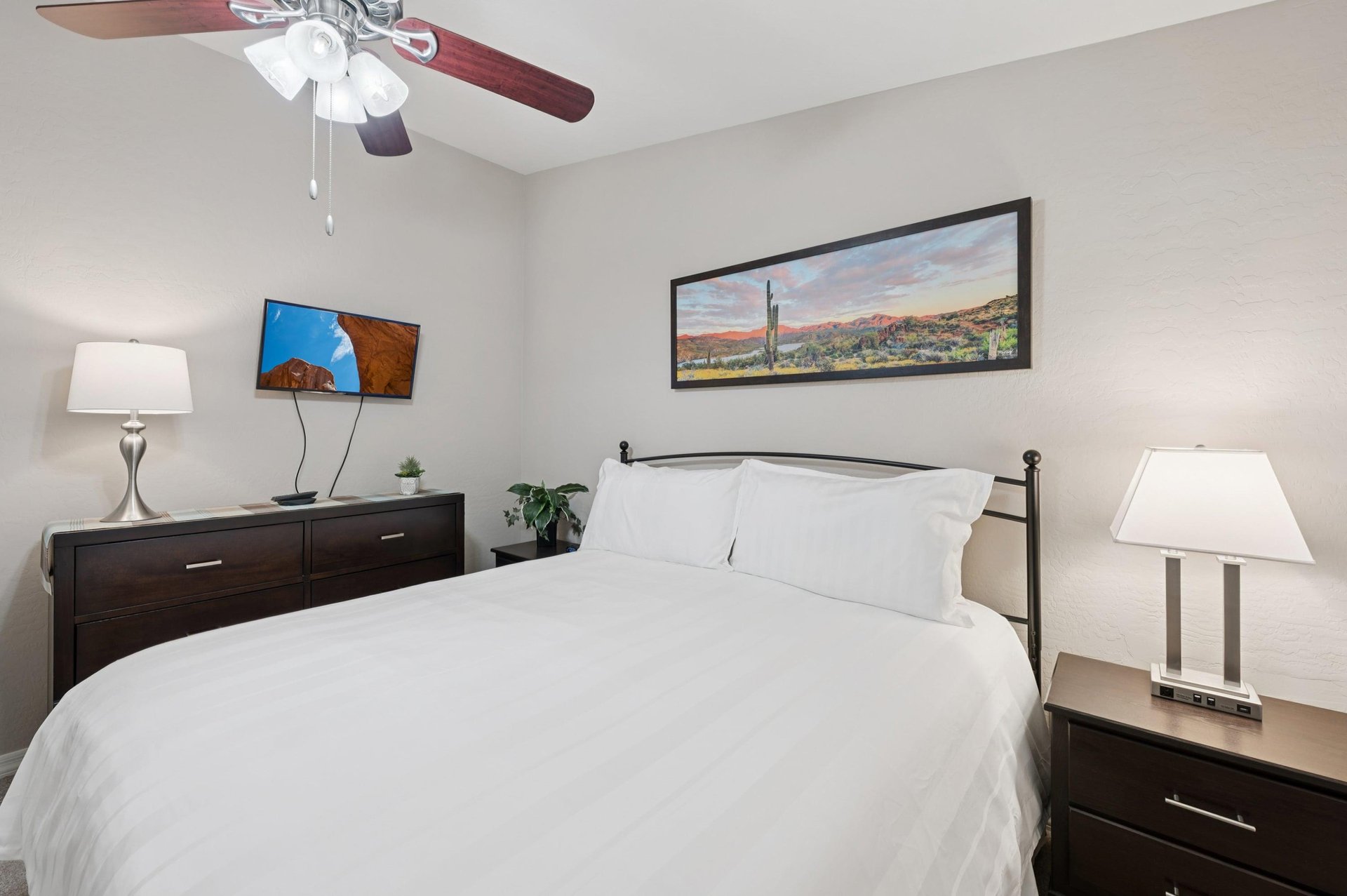 Comfy king bed with fresh linens, perfect for a restful nights sleep