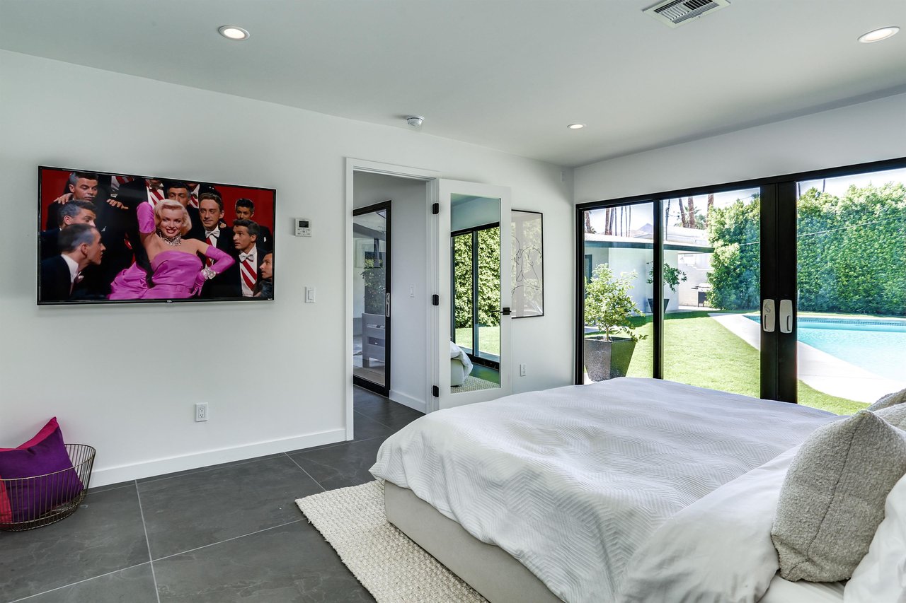 Enjoy access to the outdoors from your beautiful bedroom