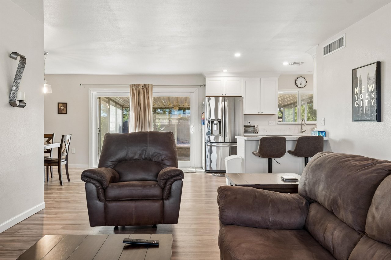 Features a flatscreen TV with streaming, pullout couch for additional sleeping space, and openconcept floor plan.