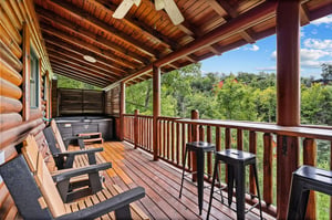 entry level back porch with hot tub