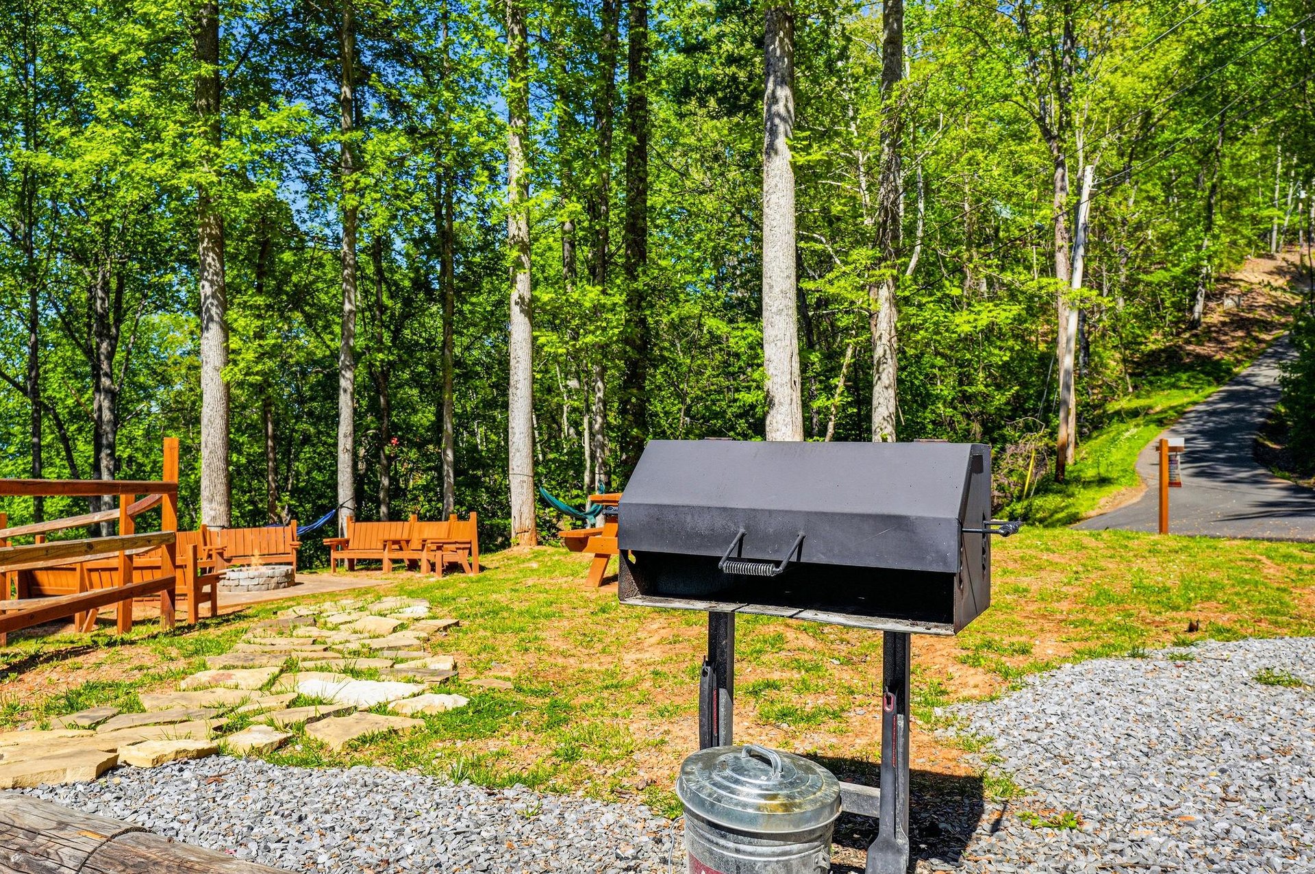 Fire up your favorite meal on this outdoor grill surrounded by towering trees and peaceful nature sounds.