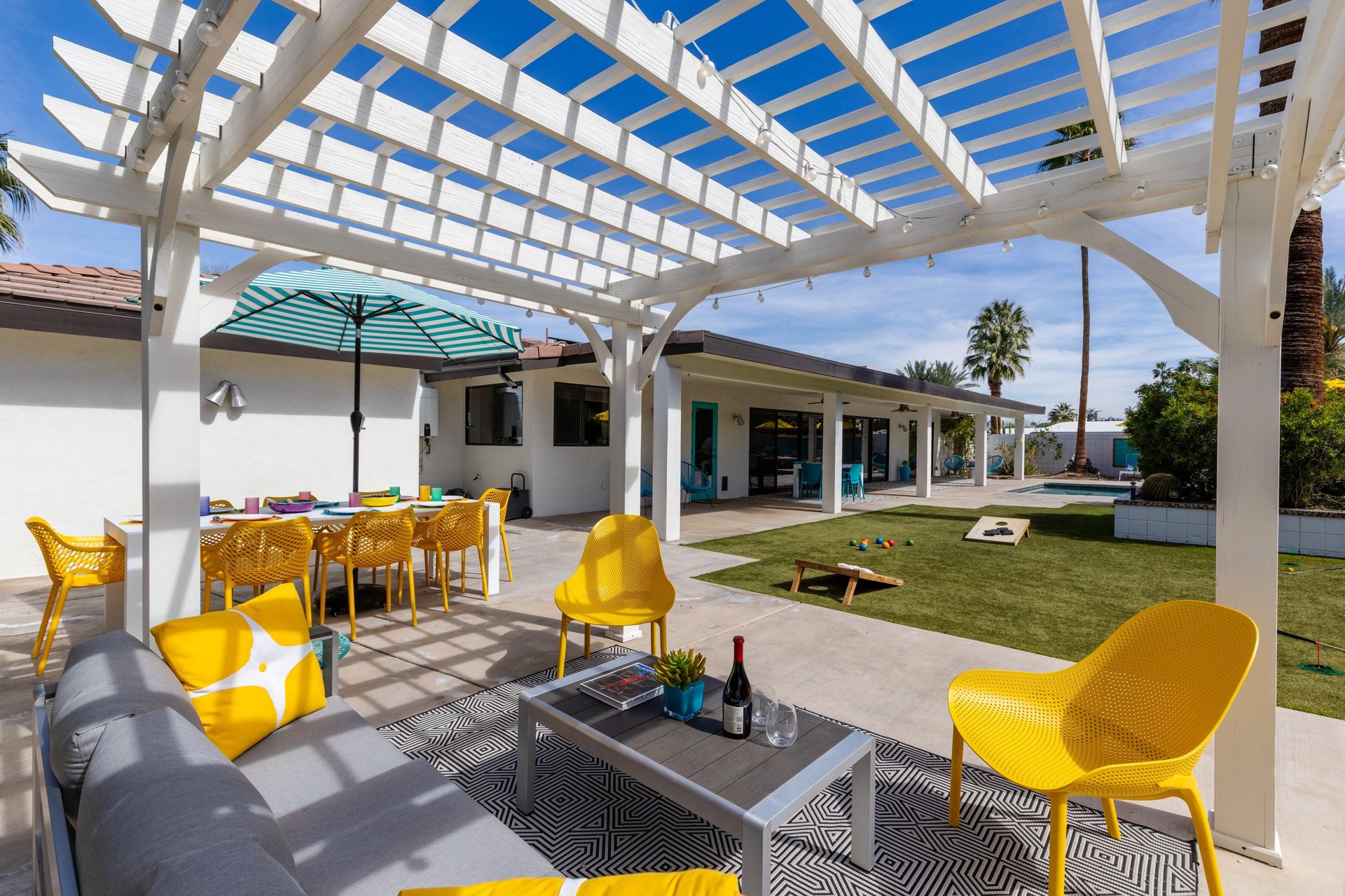 Enjoy the outdoor covered lounge area.