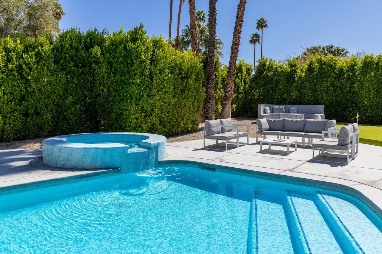 Amazing waterfall spa into the gorgeous step in pool