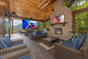 Outdoor seating with entertainment and fireplace