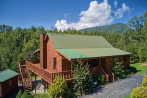 Parking area and cabin entrance at Cabin Fever, a 4bedroom cabin rental located in Pigeon Forge