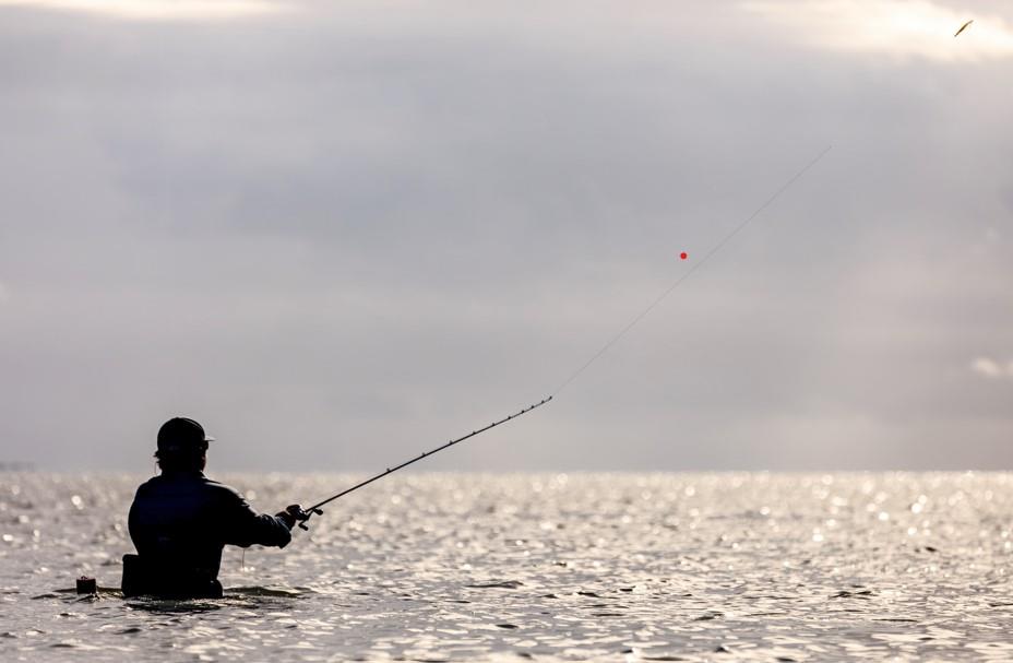 Angler saltwater fishing along the Texas coast near Port Aransas