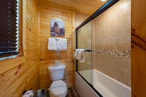 Bathroom with ShowerTub Combo at Make A Splash, a 2 bedroom cabin rental located in gatlinburg