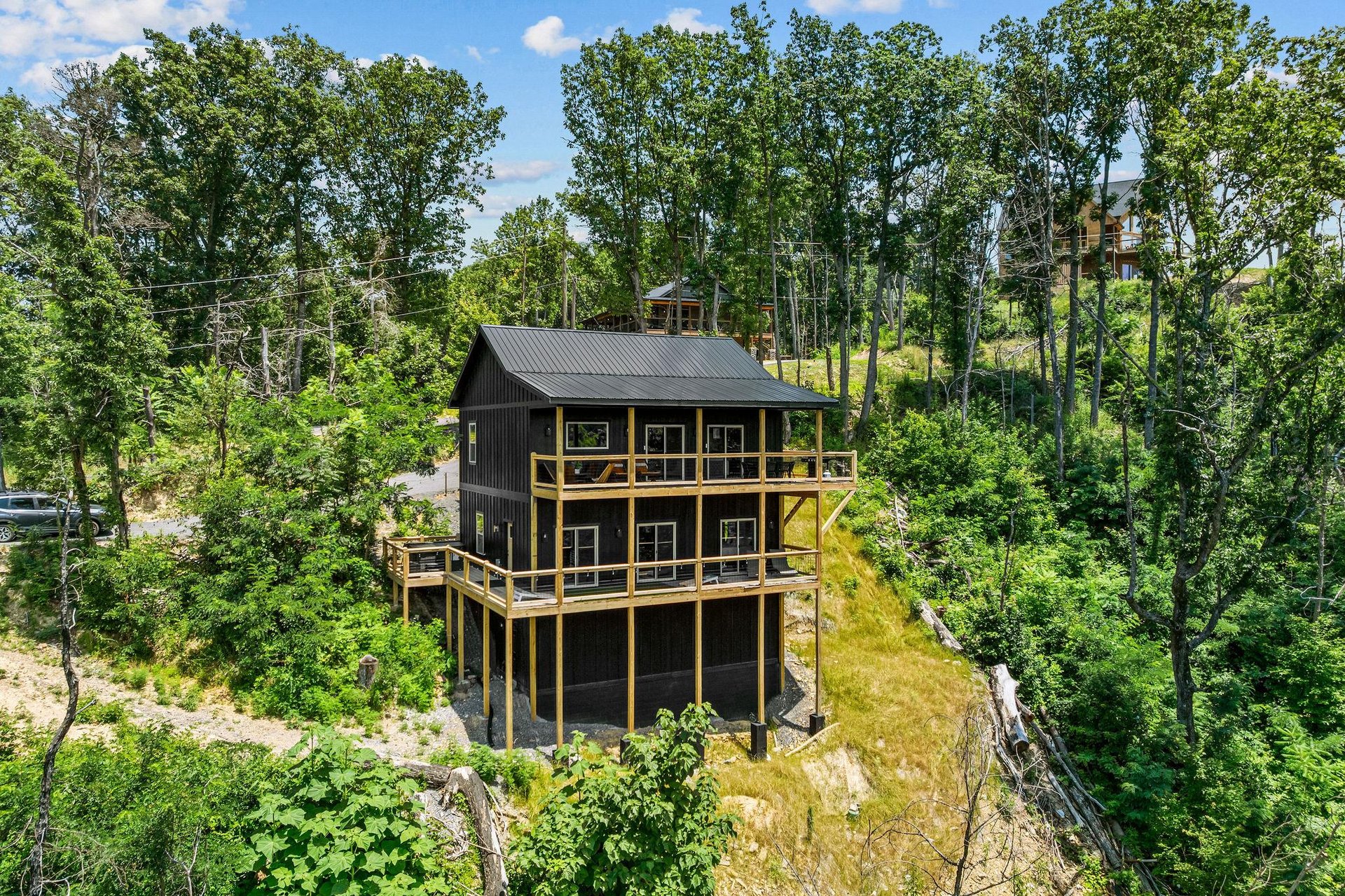 Side and back of Above the Clouds