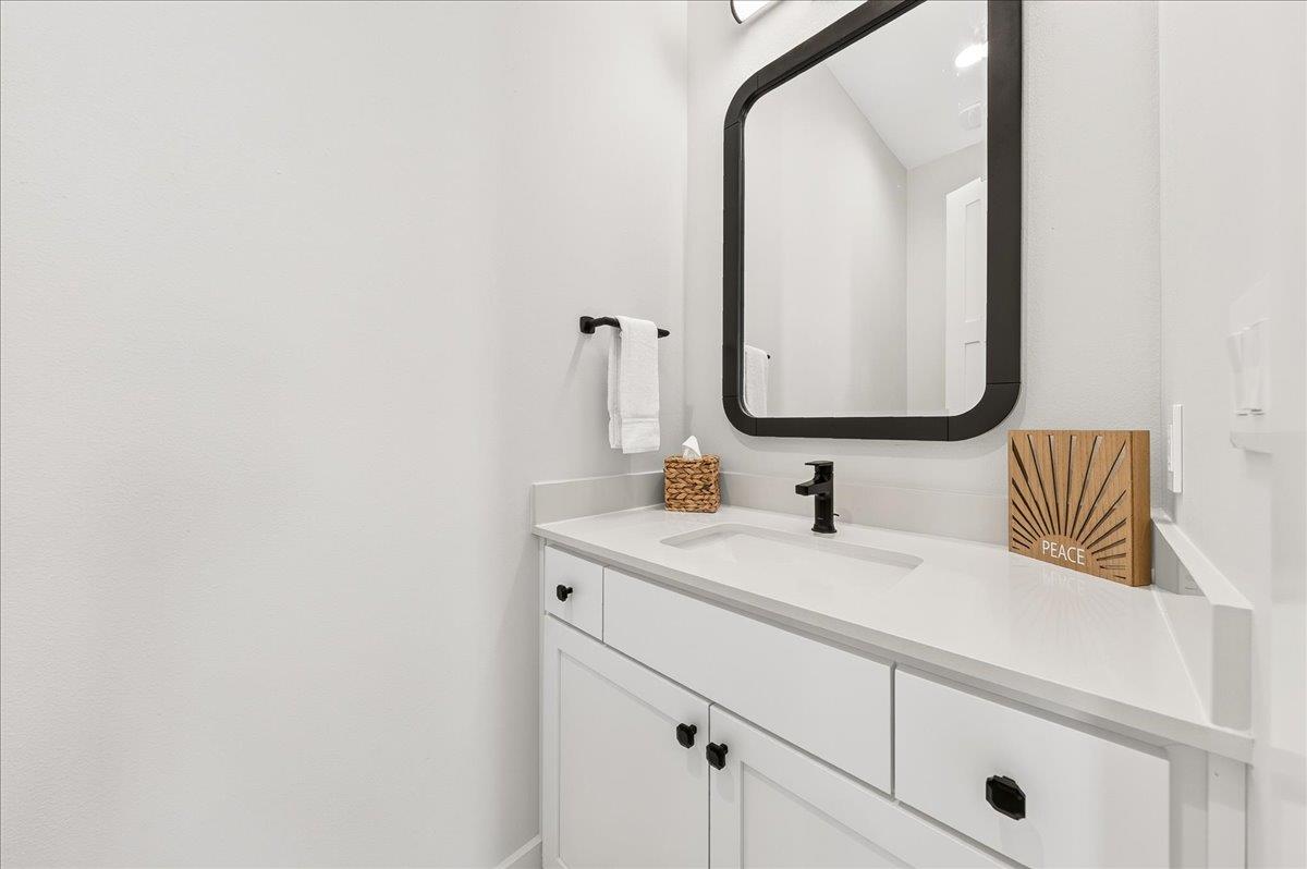 First floor powder room  located just off the game lounge