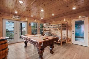 Pool table, twin bunk beds and balcony access