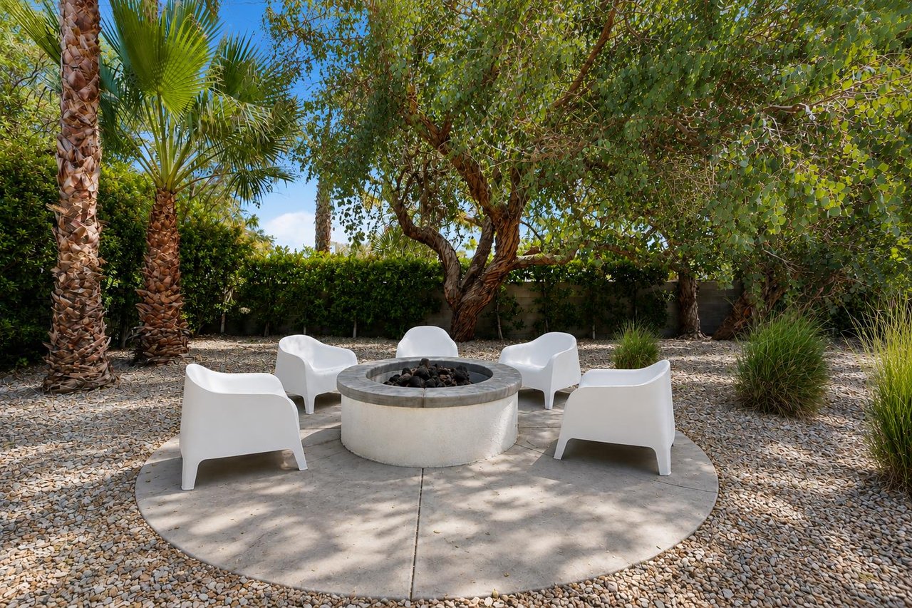 Gather around the cozy fire pit for a glass of wine
