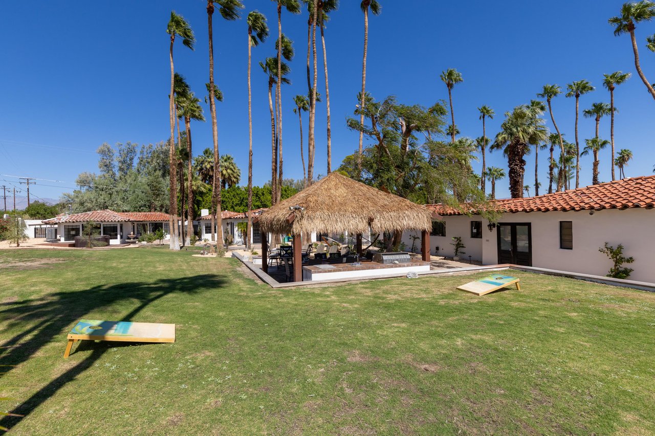 View of the outdoor kitchen and yard