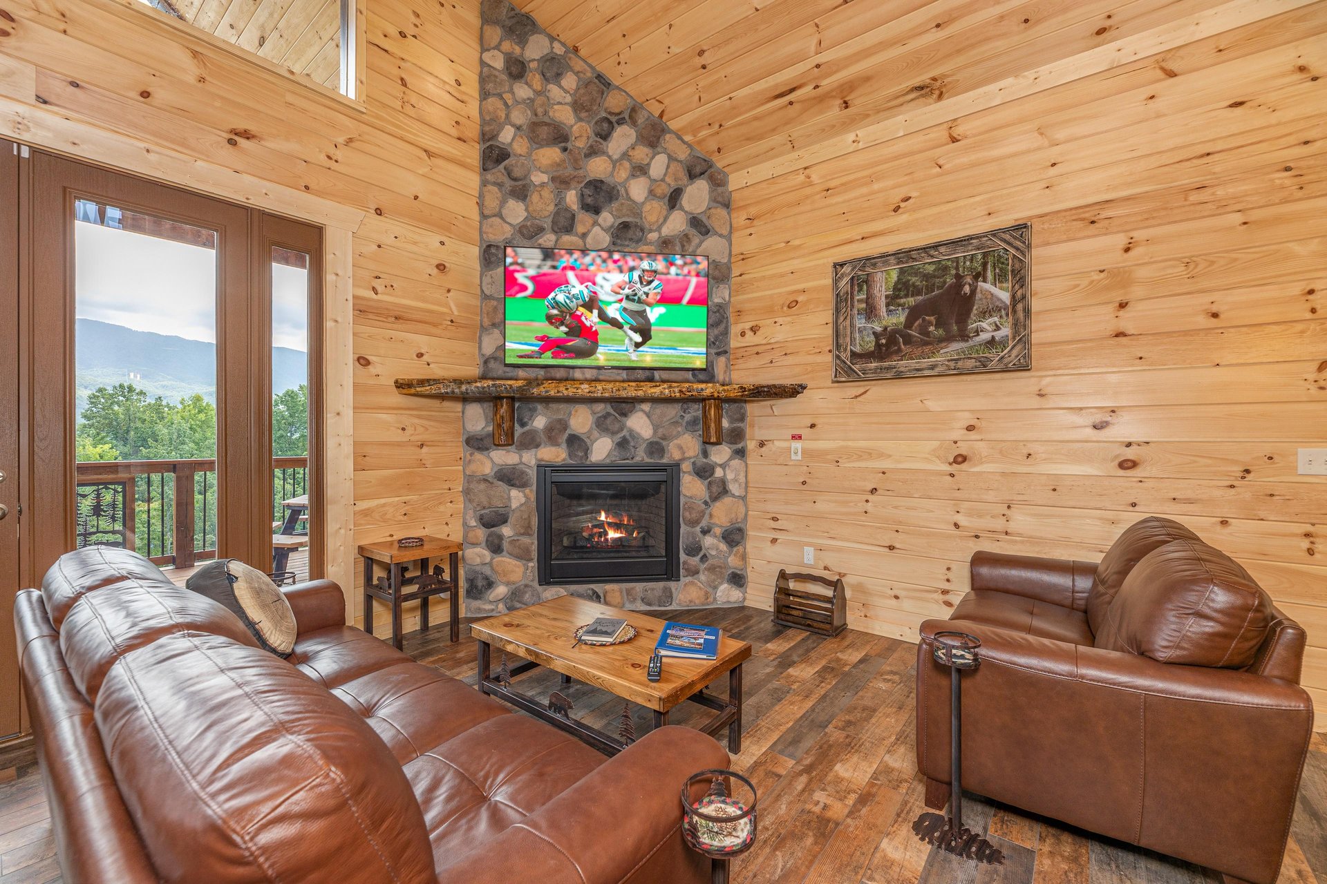 Living room with stone fireplace