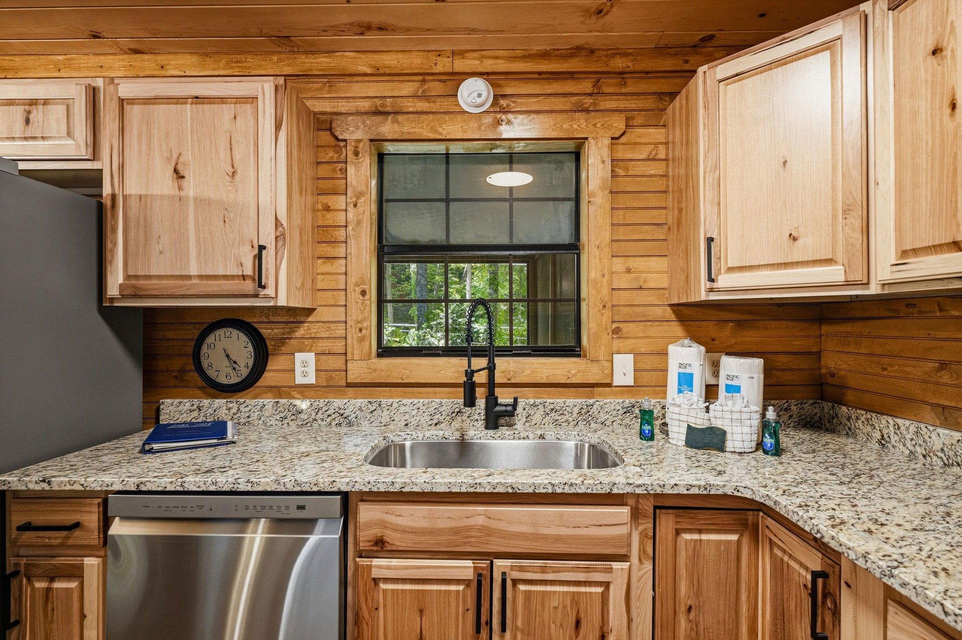 Your fullyequipped kitchen features warm wood cabinetry, granite countertops, and stainless steel appliances—everything you need to prepare meals at your own pace.