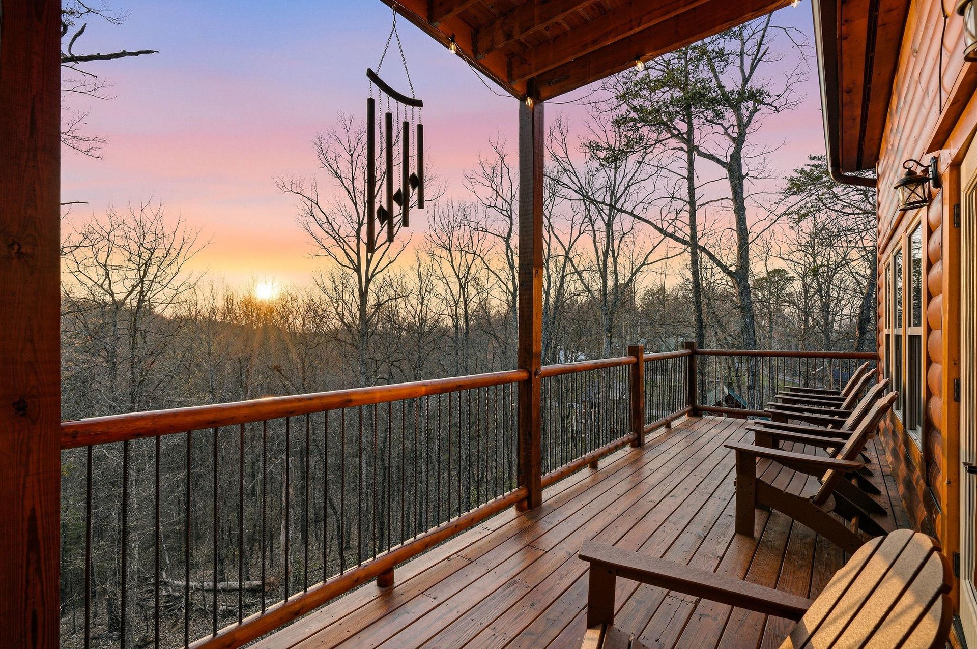 Unwind on your private deck as golden hour paints the sky, watching sunset through towering trees with gentle wind chimes creating peaceful melodies.