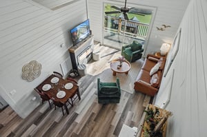 aerial view from loft of open concept living and dining room