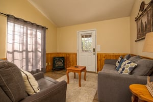 Living room seating at Liams Lookout, a 2 bedroom cabin rental located in Pigeon Forge
