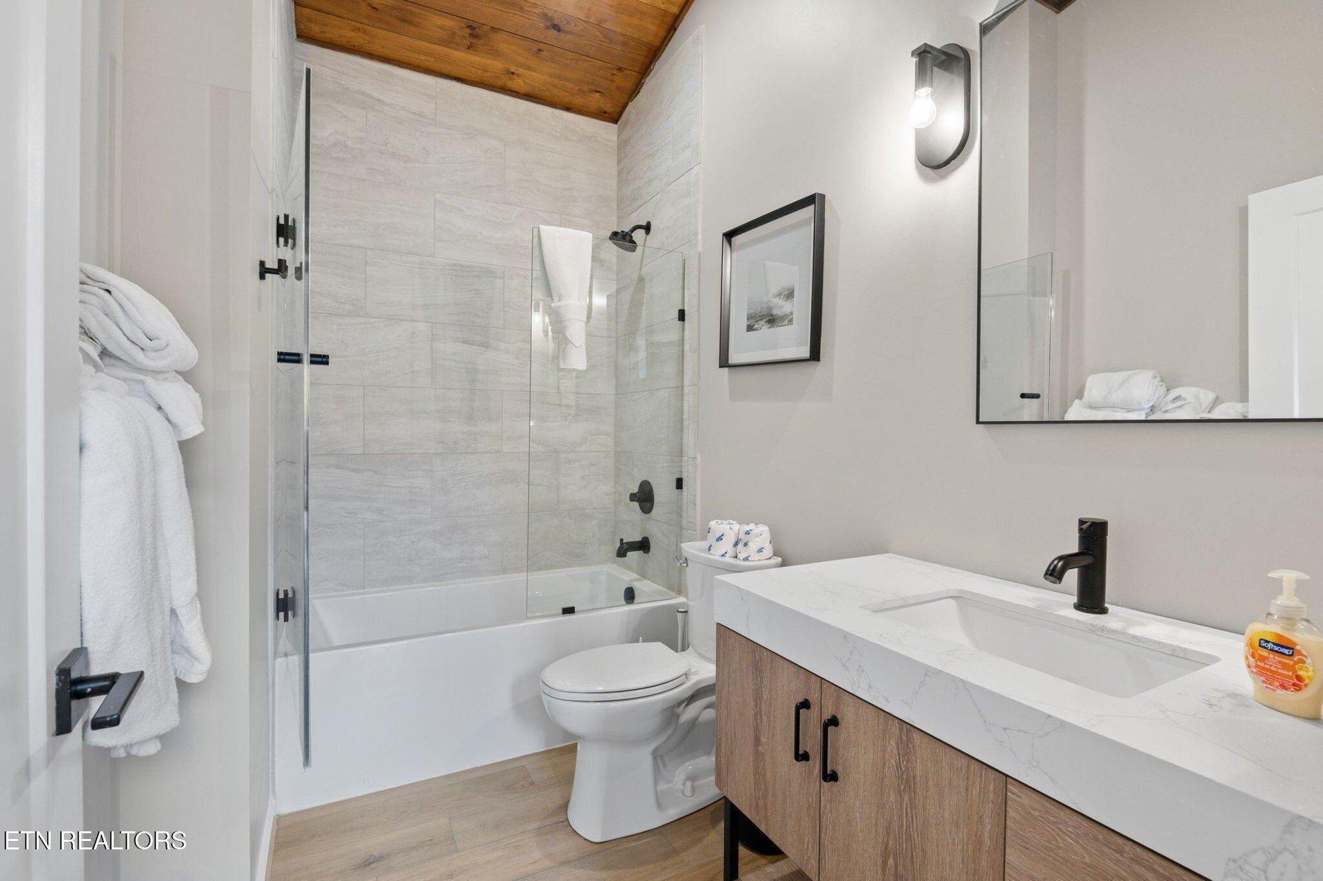 Step into your own spalike retreat. Soft towels, sleek fixtures, and a warm wood ceiling create a calming space where you can unwind after a day of adventure.