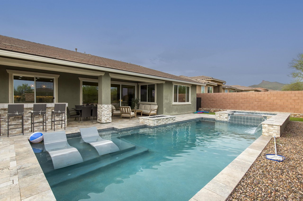 Private pool and spa with inwater lounge chairs.