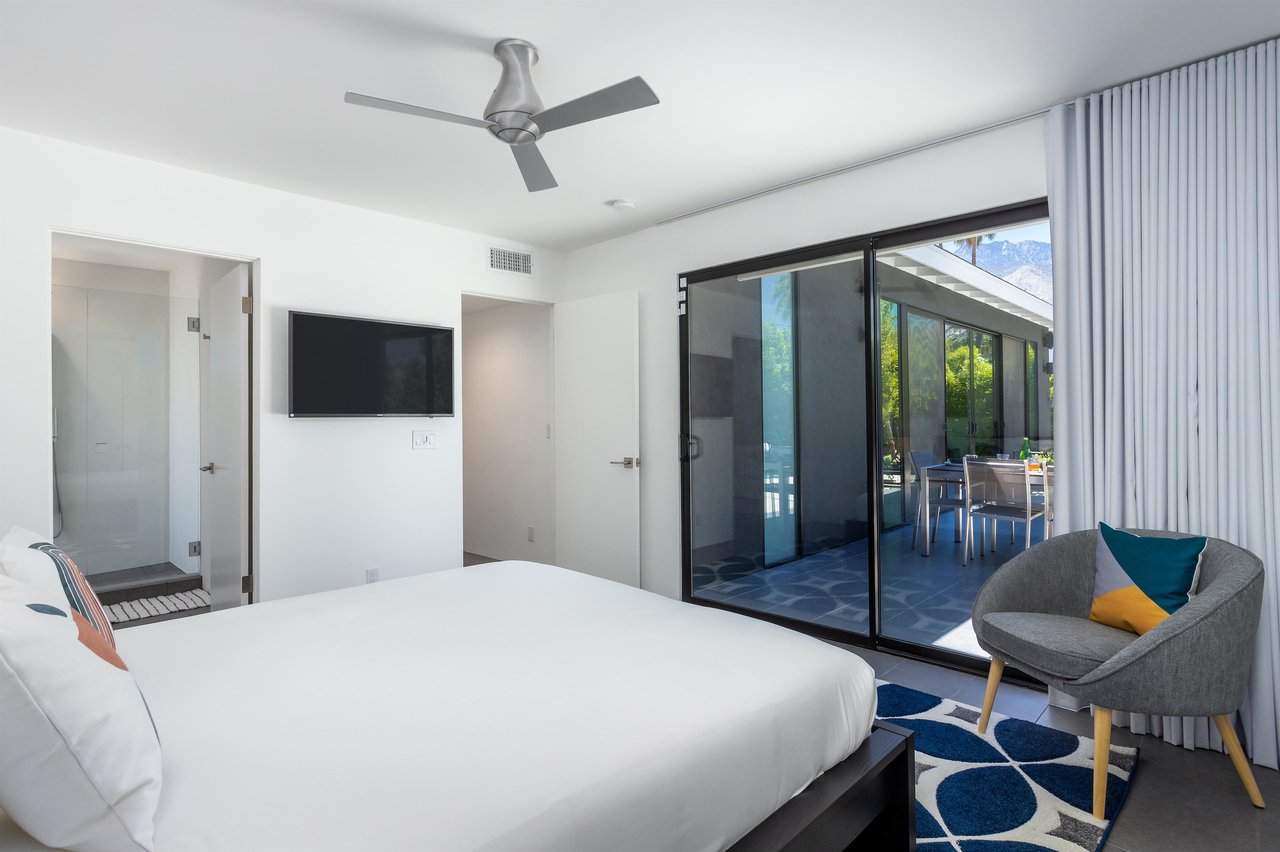 A gorgeous bedroom with outdoor access