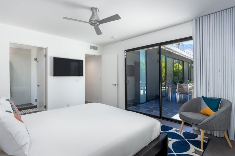 A gorgeous bedroom with outdoor access