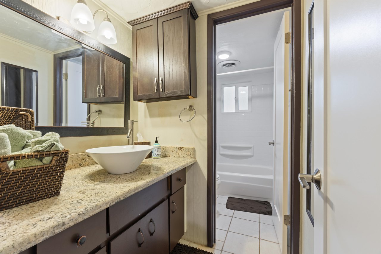 Guest bathroom with showertub combination.