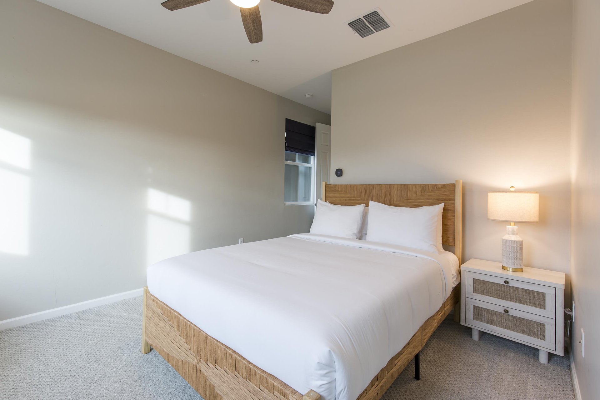 Queen size bed, ceiling fan.