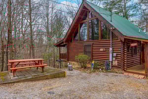 A Lovers Secret Exterior Side with Picnic Table