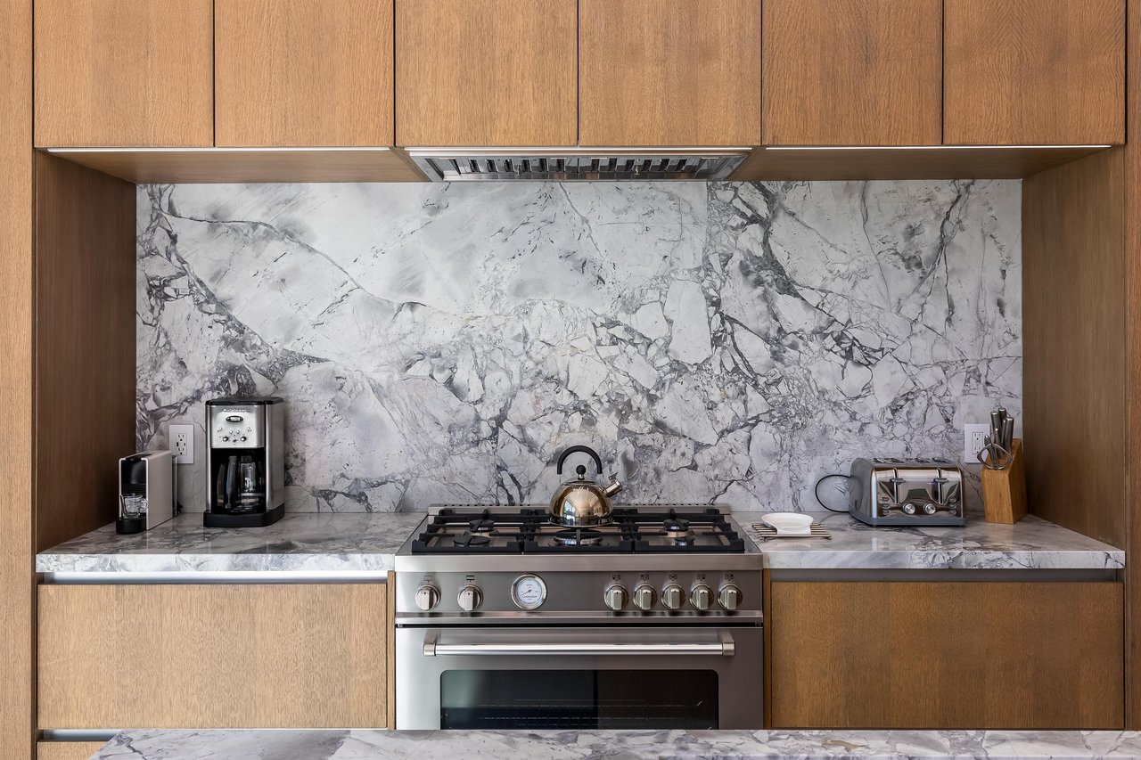 Stainless appliances and wooden cabinetry