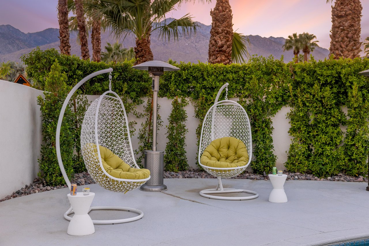 Outdoor hanging pod chairs