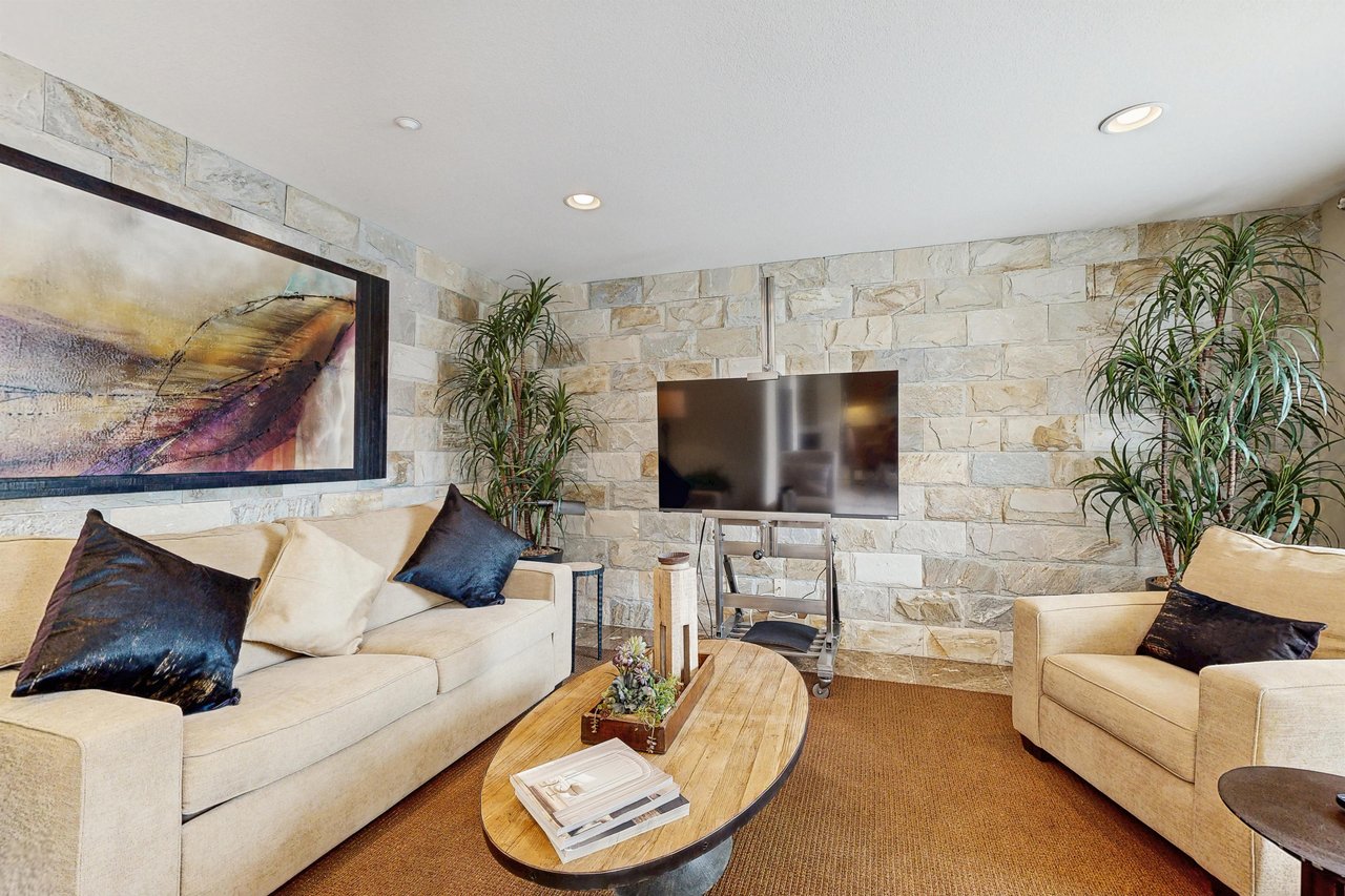 Living room with plenty of seating.