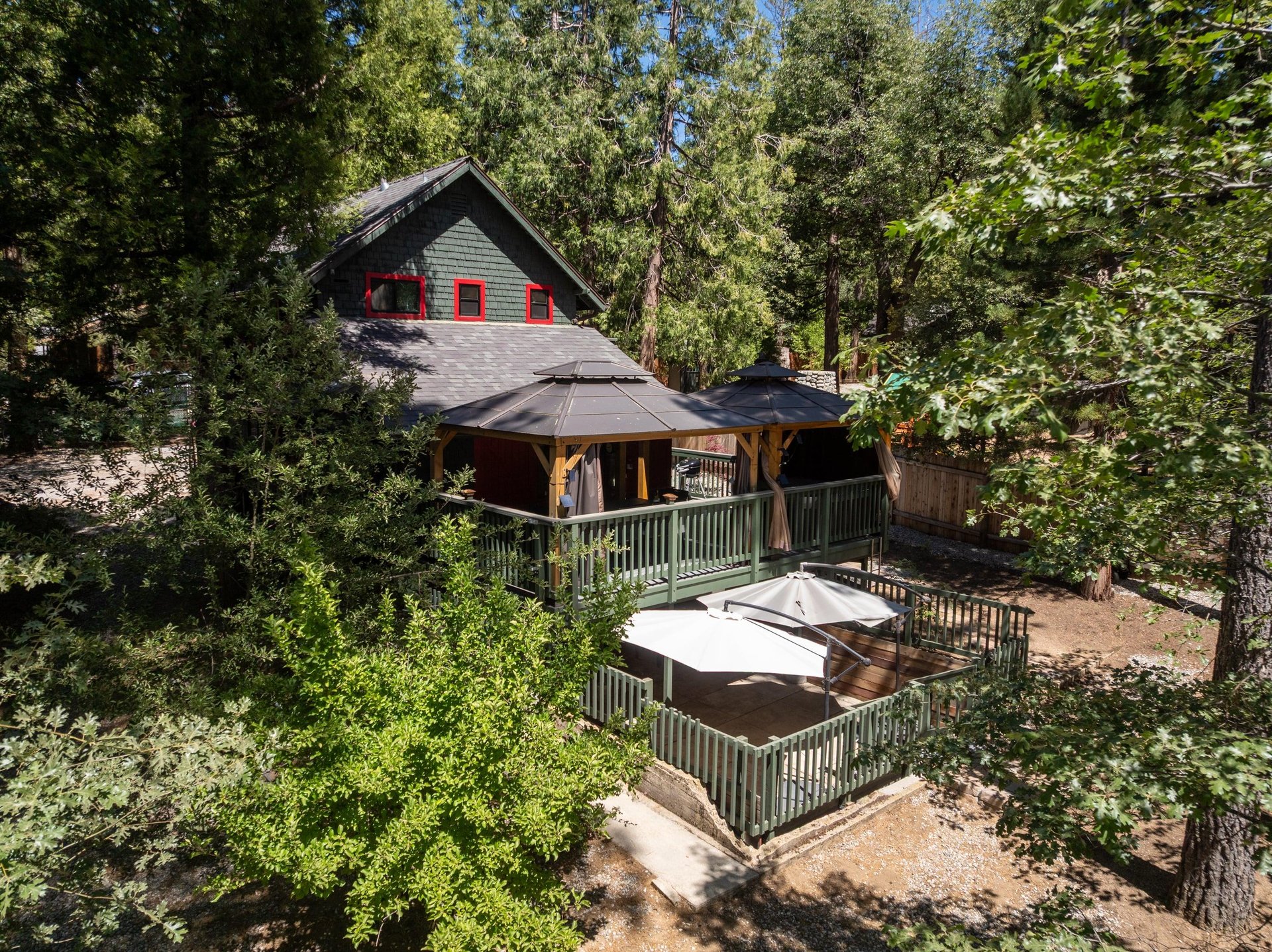 View of the entrance to the lower level outdoor seating area below the main deck.