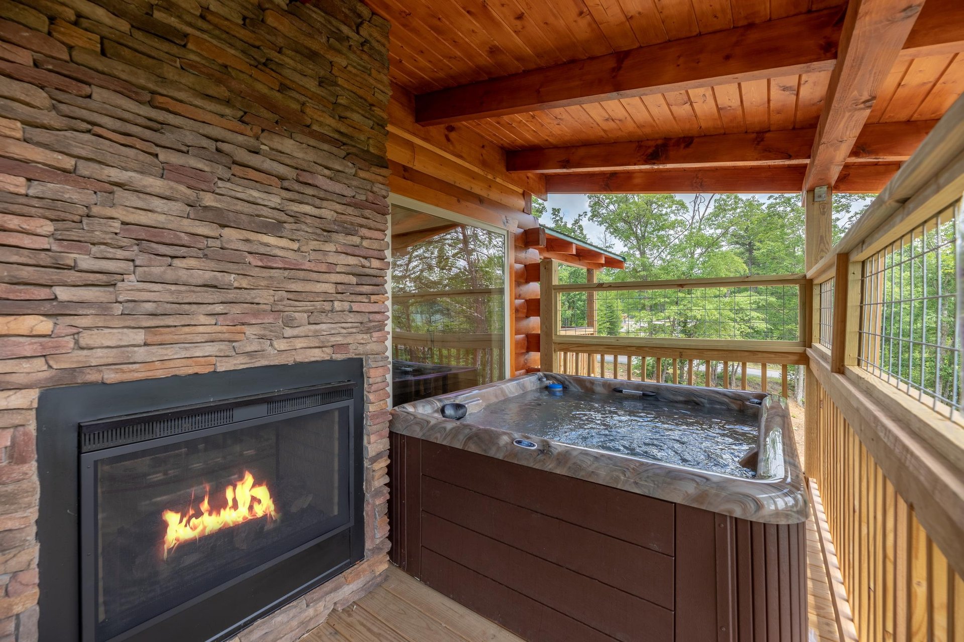 Hot tub beside fireplace