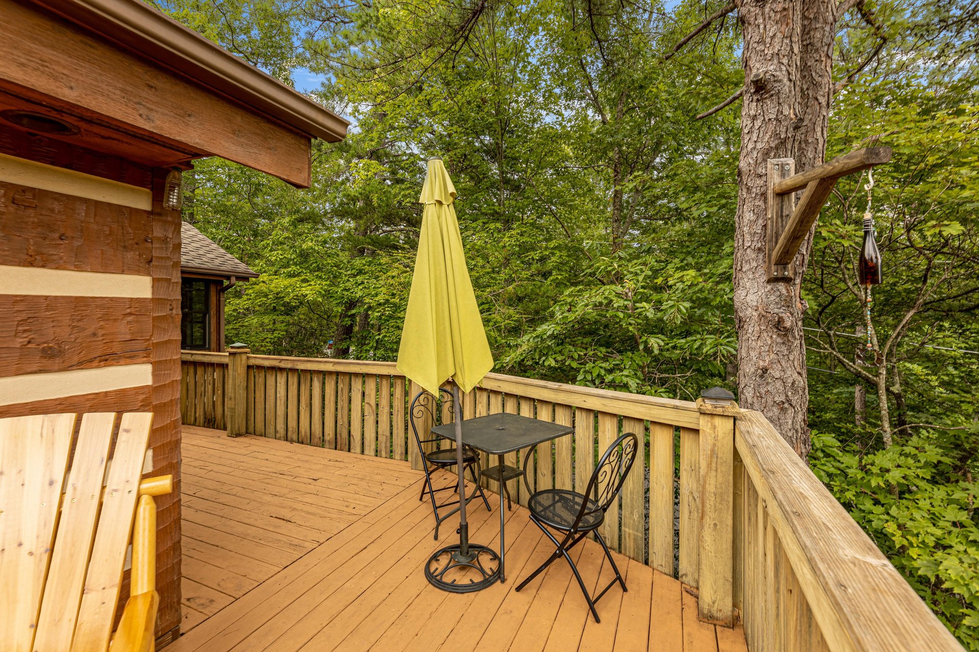 Deck table and chairs for two at Cubs Crib, a 3 bedroom cabin rental located in Gatlinburg