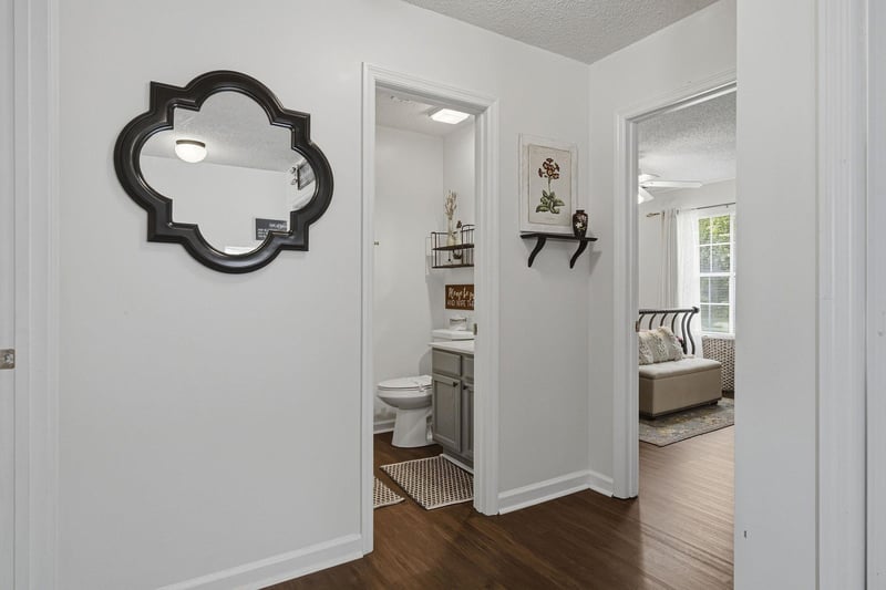 Step into your own charming retreat, where a welcoming hallway connects your cozy bedroom with a wellappointed bathroom—perfectly designed for your comfort and ease during your stay.