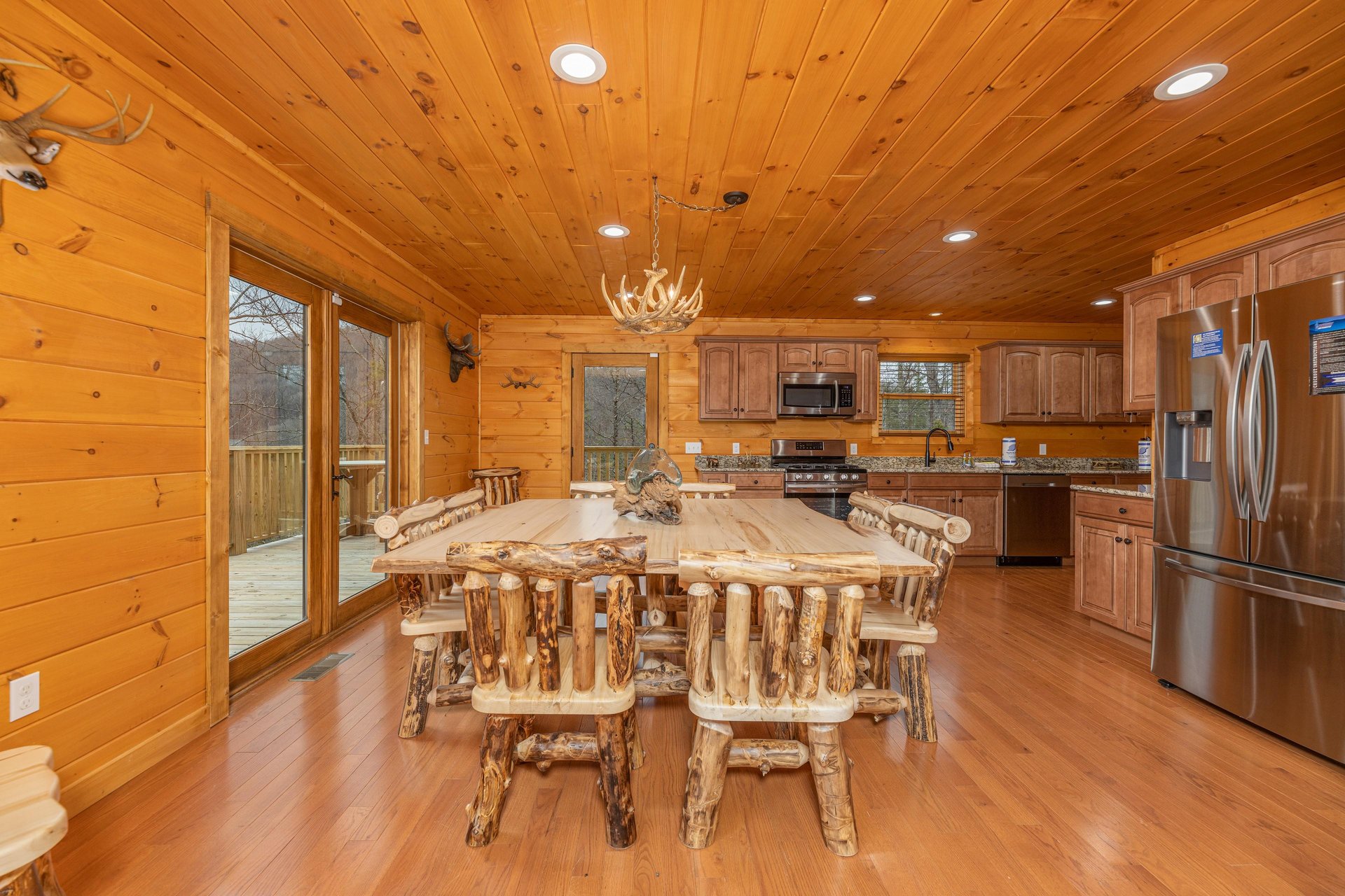 Dining room and kitchen at Js Hideaway, a 4 bedroom cabin rental located in Pigeon Forge