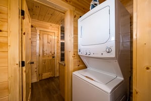 Washer and dryer attached to entry level bathroom