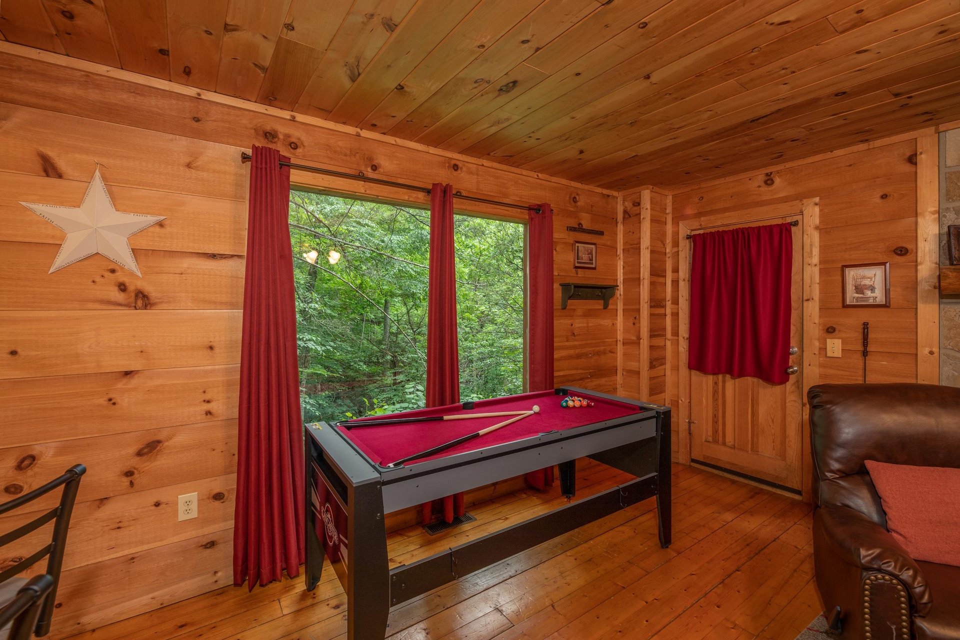 Pool table at Logans Smoky Den, a 2 bedroom cabin rental located in Pigeon Forge