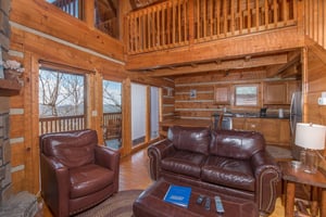 Loveseat and recliner at EllaVation, a 3 bedroom cabin rental located in Gatlinburg